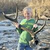 Sam Clarkson holds an elk antler he found