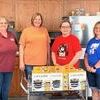 CAPNCM delivered crockpots &amp; cookbooks to Tri-County School in Jamesport recently. The school plans to use the donation as part of their ProStart program, which allows students to earn a certificate when they graduate high school. (left to right: Sherry Hoerrmann, Misty Savage, Jayla Smith, and Traci Savage)