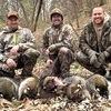 John Hummer, Valen Selsor and Dustin Holmes with the seven ­raccoons they called in on a recent hunt.
Valon Selsor photo