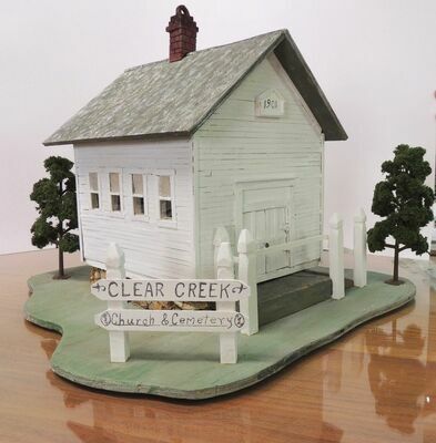 A replica of the Clear Creek Church will be sold at auction at the annual Jamesport Fire and ­Rescue Appreciation Night on ­October 16. The auction will be held at the Event Center.
	The house is handmade by Peggy Sperry. Mrs. Sperry is well known for her talent in construction replicas of many landmarks in the area.